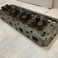 41.033 Engine Cylinder Head 327544 | 25” Long | 9” Wide | 3-3/4” Thick