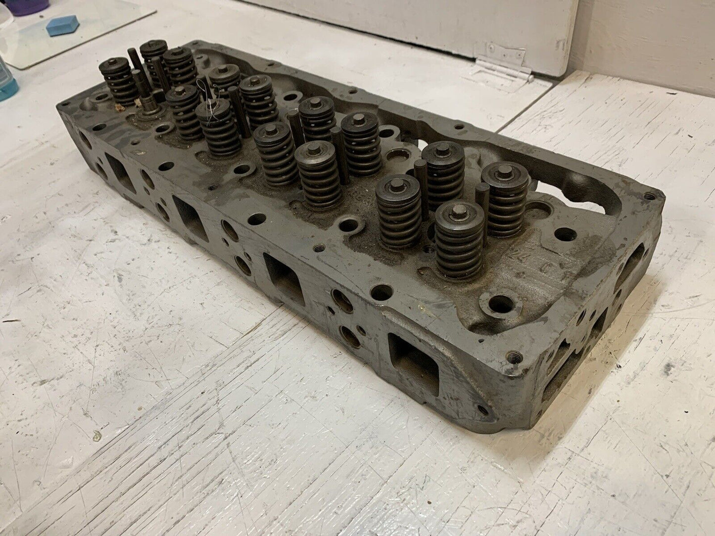 41.033 Engine Cylinder Head 327544 | 25” Long | 9” Wide | 3-3/4” Thick