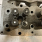 41.033 Engine Cylinder Head 327544 | 25” Long | 9” Wide | 3-3/4” Thick