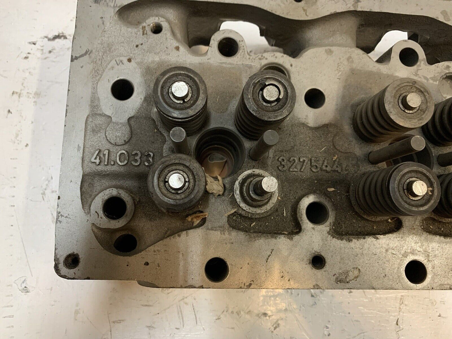 41.033 Engine Cylinder Head 327544 | 25” Long | 9” Wide | 3-3/4” Thick