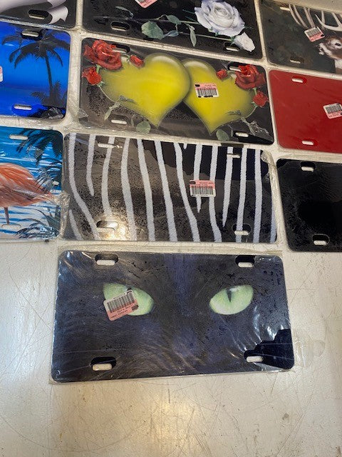 10 Qty of Various Adv. Graphics 4-Hole License Plates 11-3/4" x 5-3/4" (10 Qty)