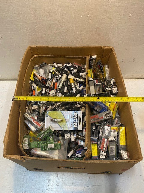 50lb Box of a Variety of Laser, Autolite, Bosch, AC Delco, Motocraft Spark Plugs