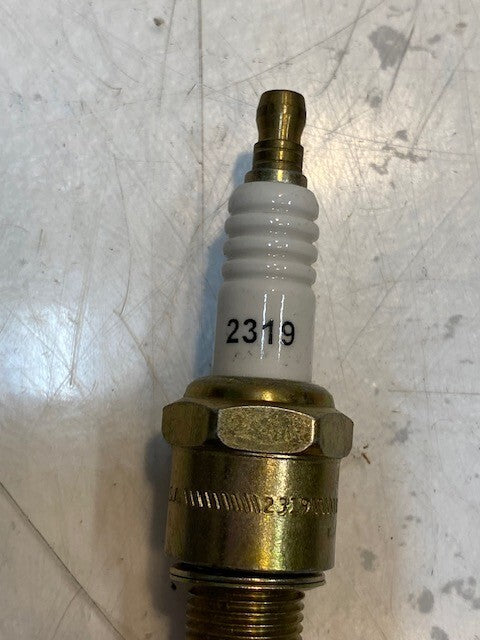 135lb Box of a Variety of Autolite, Champion, Bosch, Mighty, Denso Spark Plugs