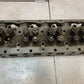 41.033 Engine Cylinder Head 327544 | 25” Long | 9” Wide | 3-3/4” Thick