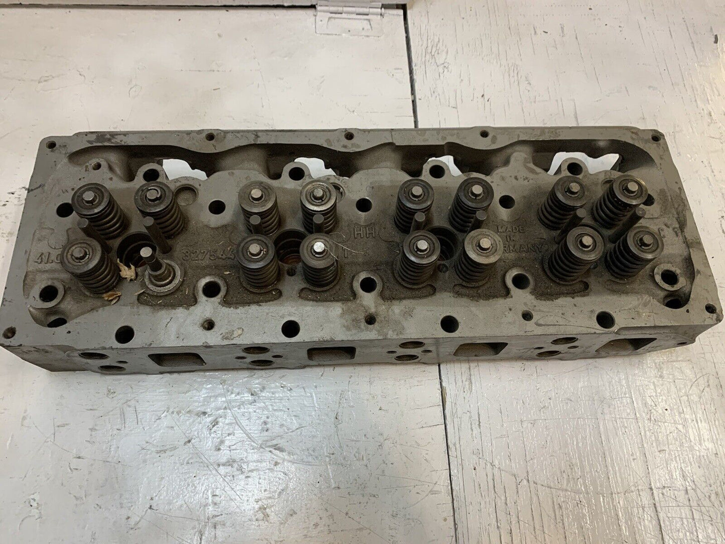 41.033 Engine Cylinder Head 327544 | 25” Long | 9” Wide | 3-3/4” Thick