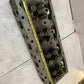 41.033 Engine Cylinder Head 327544 | 25” Long | 9” Wide | 3-3/4” Thick