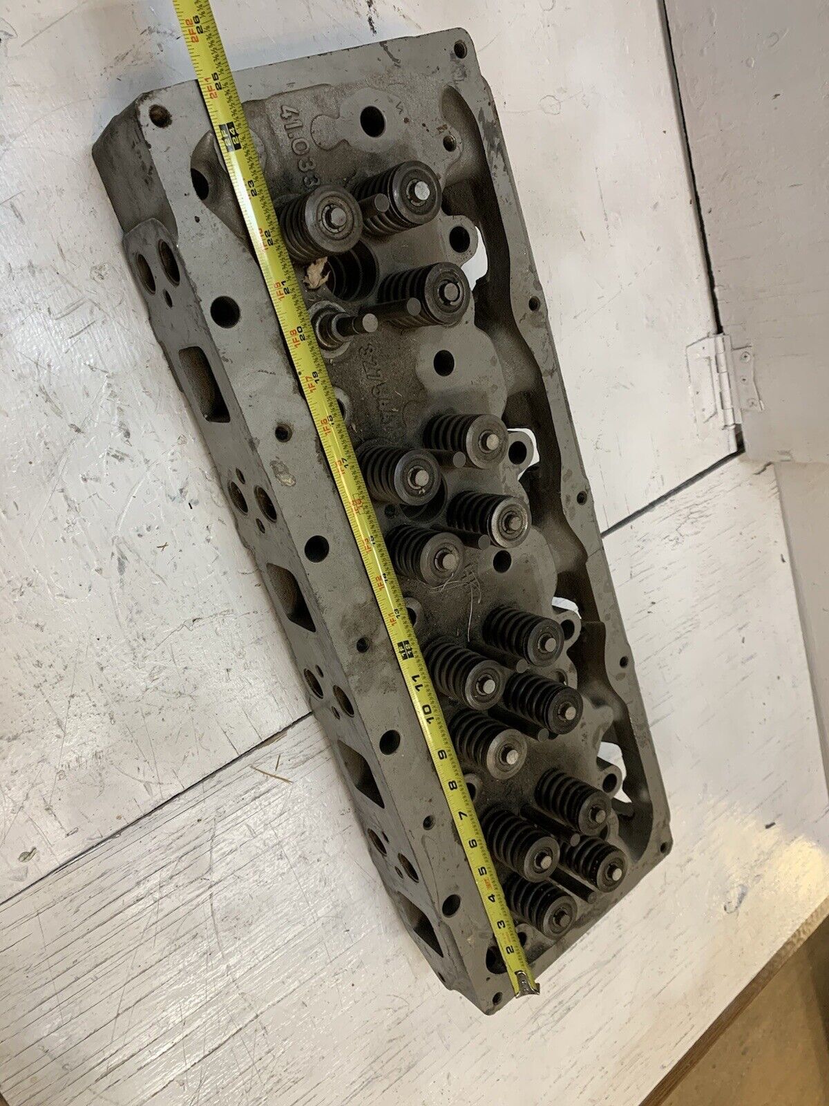 41.033 Engine Cylinder Head 327544 | 25” Long | 9” Wide | 3-3/4” Thick