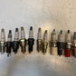 135lb Box of a Variety of Autolite, Champion, Bosch, Mighty, Denso Spark Plugs