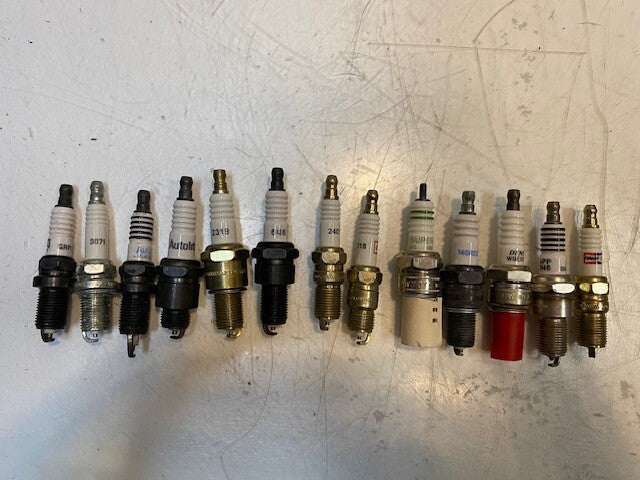 135lb Box of a Variety of Autolite, Champion, Bosch, Mighty, Denso Spark Plugs