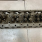 41.033 Engine Cylinder Head 327544 | 25” Long | 9” Wide | 3-3/4” Thick