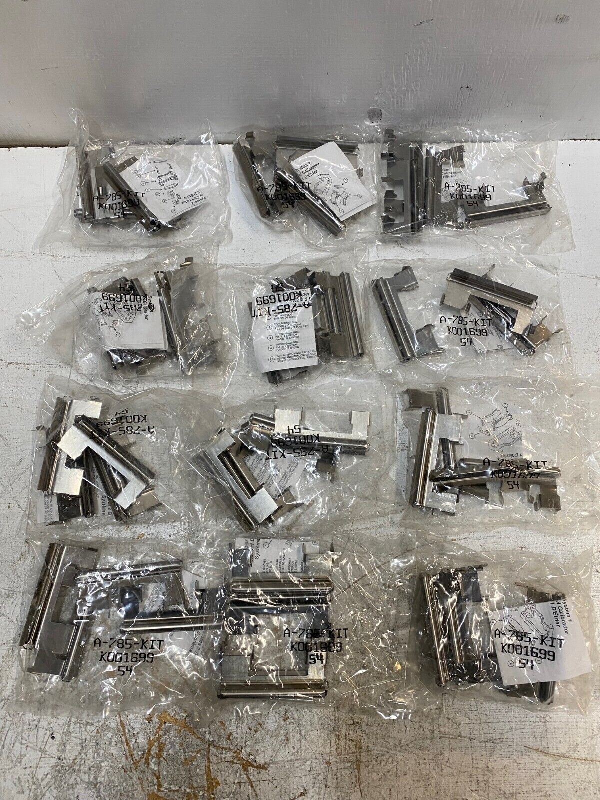 12 Packs of Caliper Abutment Clips - 4 In Each | A-785-KIT | K001699 (48 Total)