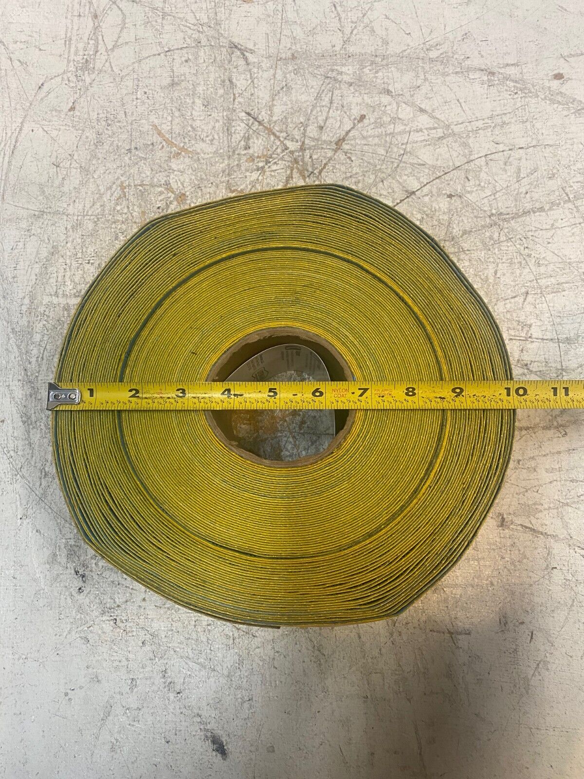 Mighty Line Yellow Safety Floor Tape 4" Thick on 3" Wheel with 10" Diameter