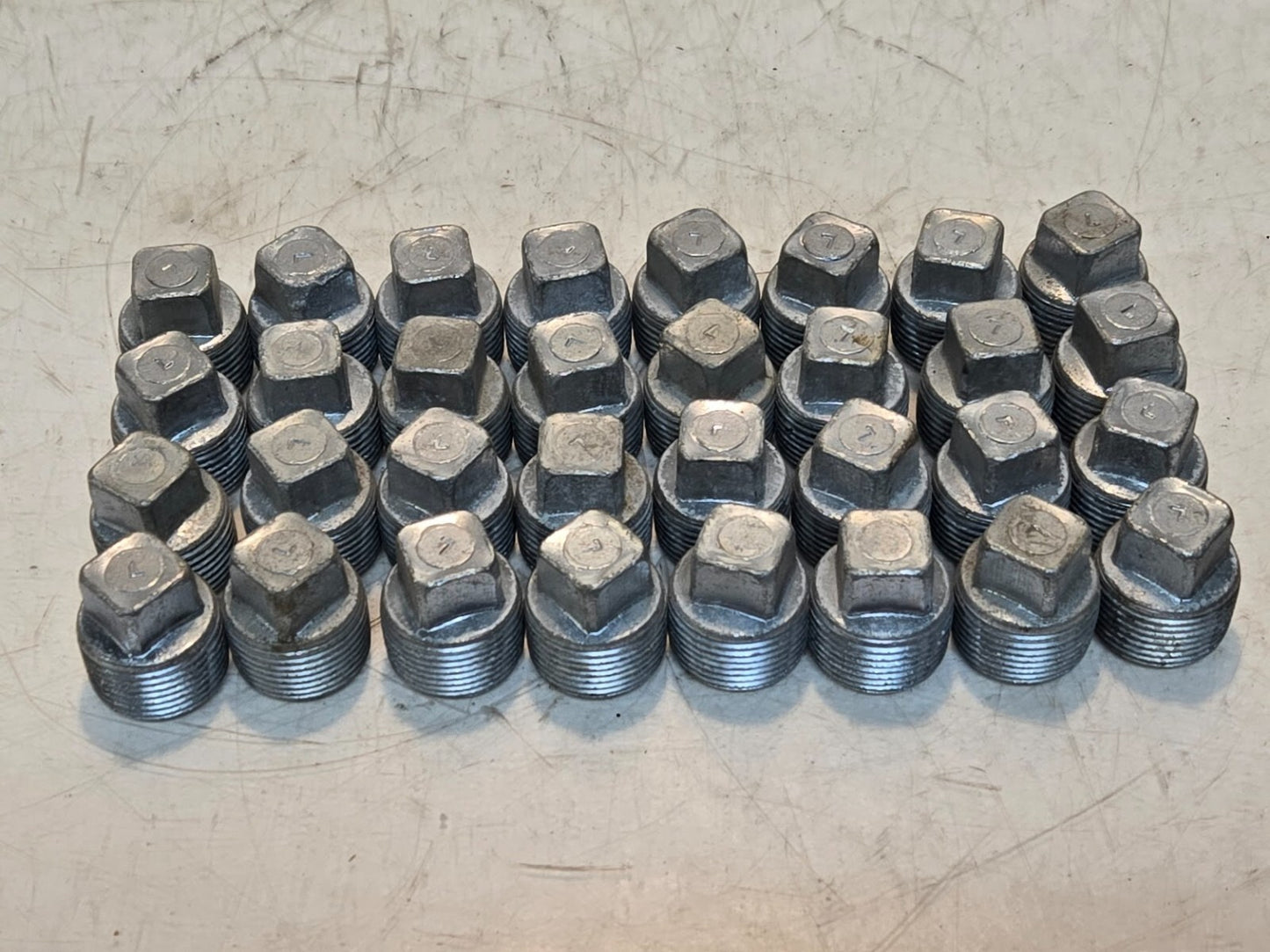 32 Quantity of 3/4" MPT Galvanized Plugs | 5/8" Square Drive (32 Quantity)