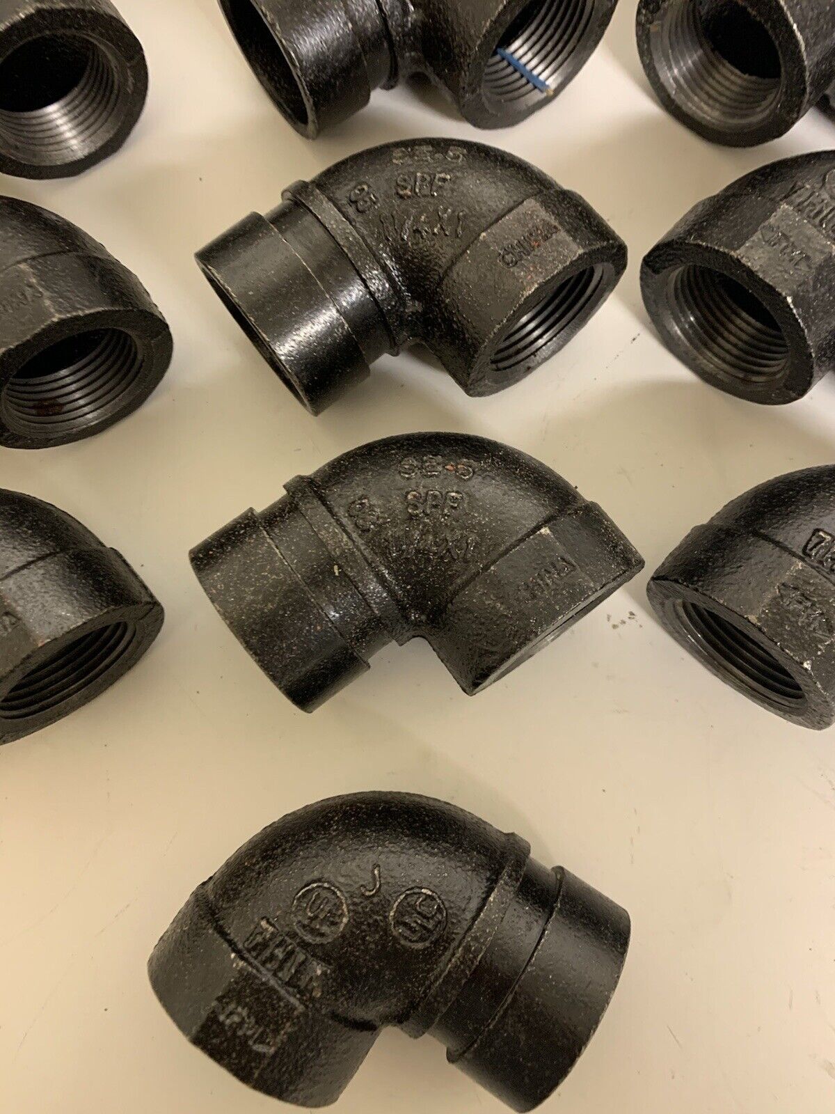 Lot of 16 90 Degree Reducing Elbow Cast Iron Fittings SE-5 SPF 1-1/4” x 1”