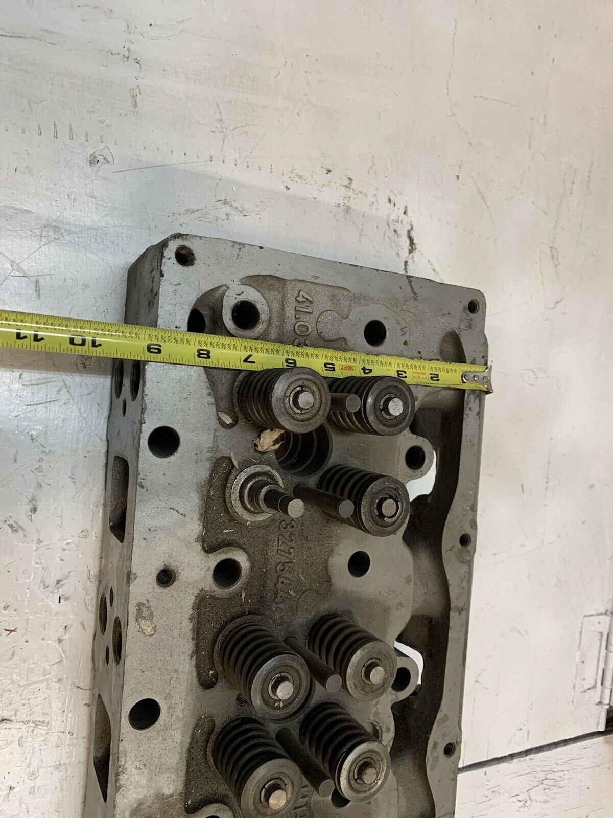 41.033 Engine Cylinder Head 327544 | 25” Long | 9” Wide | 3-3/4” Thick