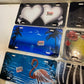 10 Qty of Various Adv. Graphics 4-Hole License Plates 11-3/4" x 5-3/4" (10 Qty)