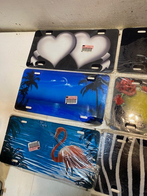 10 Qty of Various Adv. Graphics 4-Hole License Plates 11-3/4" x 5-3/4" (10 Qty)