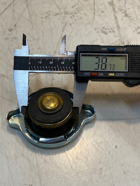 7 Quantity of Radiator Caps 14 | S | 3-1/8" L 2-1/4" W 39mm ID (7 Quantity)