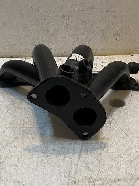 4-Arm Exhaust Manifold 40" Main Bore 14-1/2" Long 11" Wide 5-1/2" Tall