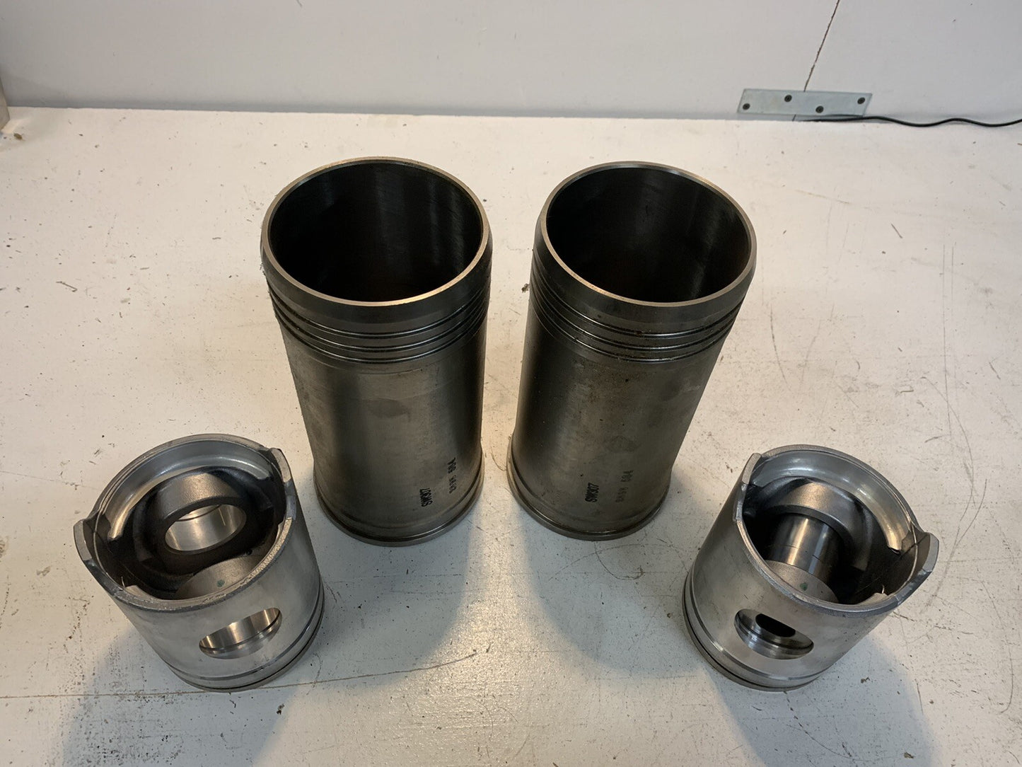 2 Pack of AP308 Pistons and Sleeves SW307 2898 584 (2 Quantity of Each)