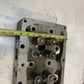 41.033 Engine Cylinder Head 327544 | 25” Long | 9” Wide | 3-3/4” Thick