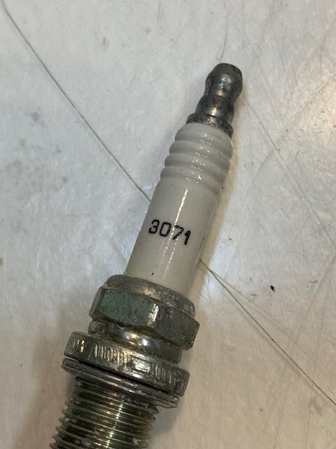 135lb Box of a Variety of Autolite, Champion, Bosch, Mighty, Denso Spark Plugs