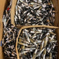 135lb Box of a Variety of Autolite, Champion, Bosch, Mighty, Denso Spark Plugs