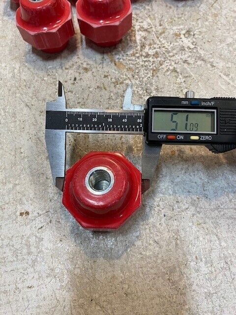 7 Quantity of Red Octogonal Insulators 11mm Bore 51mm OD 51mm Tall (7 Quantity)