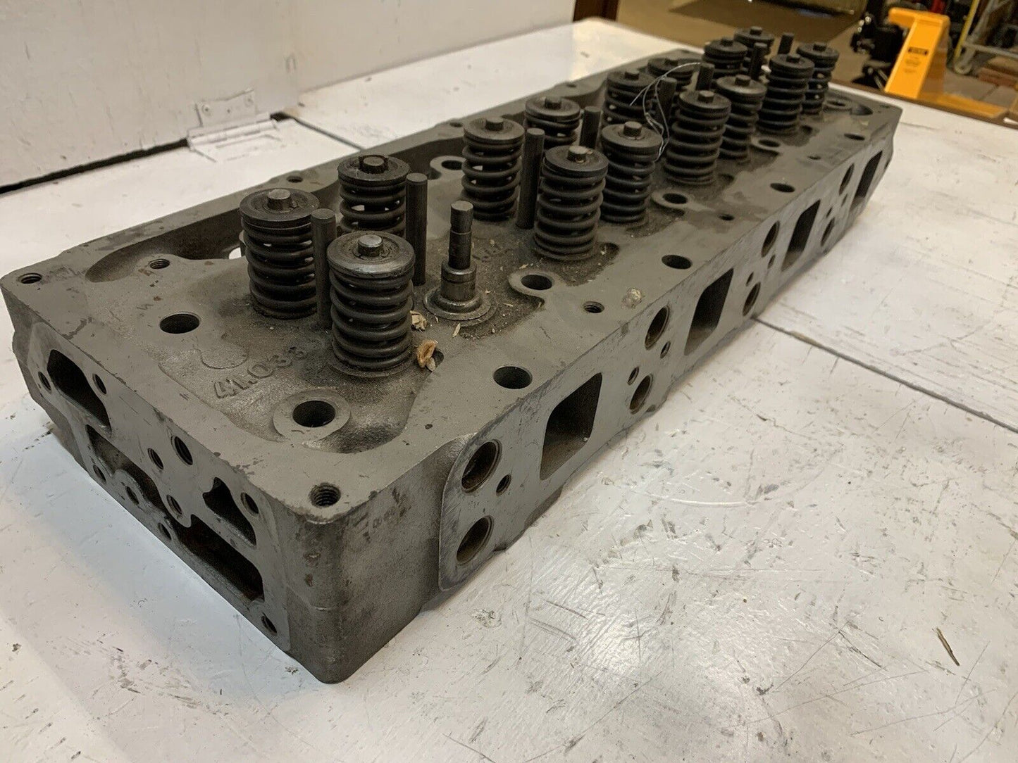 41.033 Engine Cylinder Head 327544 | 25” Long | 9” Wide | 3-3/4” Thick