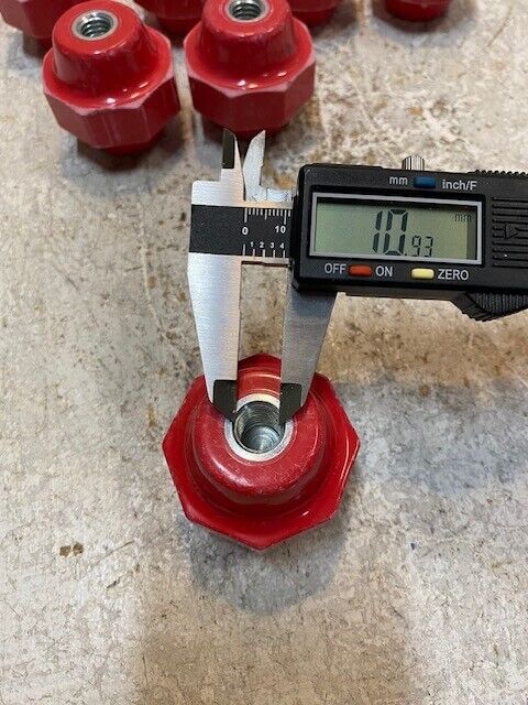 7 Quantity of Red Octogonal Insulators 11mm Bore 51mm OD 51mm Tall (7 Quantity)