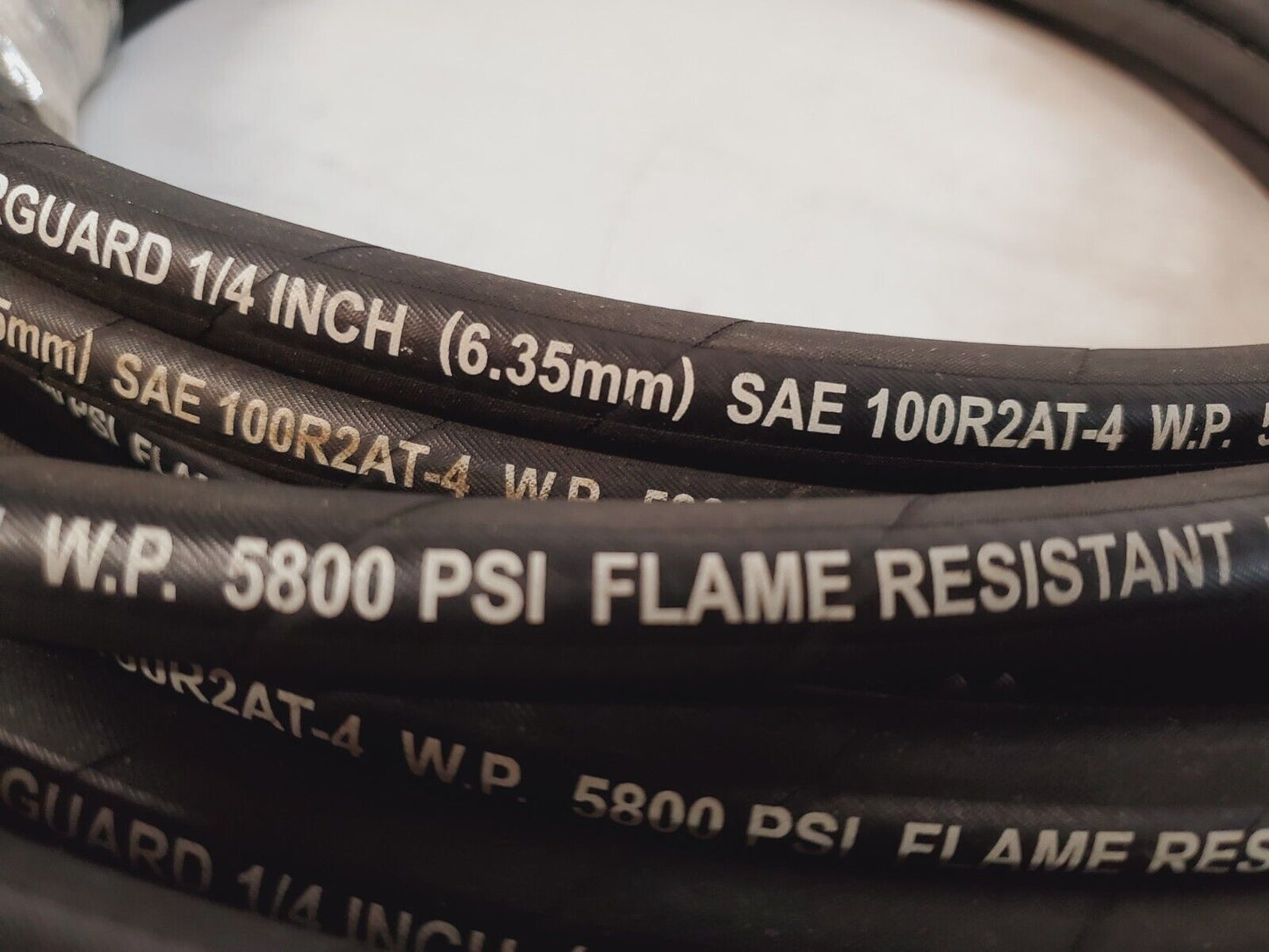 NRP Jones Hydraulic Hose 100R2 | SAE 100R2AT-4 | 5800PSI | Flame Resistant 50Ft