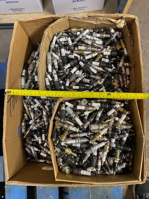 135lb Box of a Variety of Autolite, Champion, Bosch, Mighty, Denso Spark Plugs