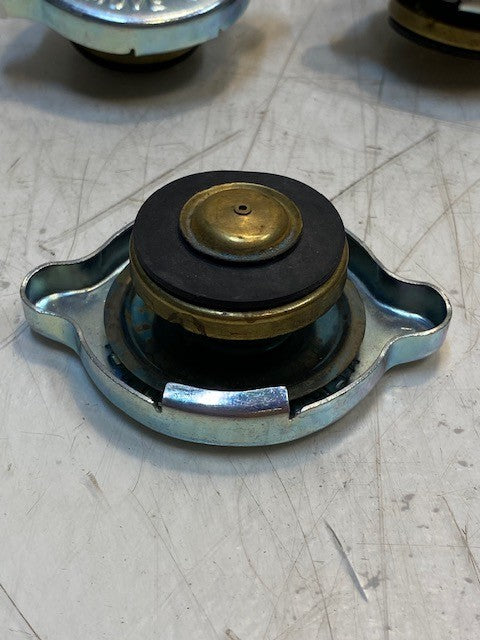 7 Quantity of Radiator Caps 14 | S | 3-1/8" L 2-1/4" W 39mm ID (7 Quantity)