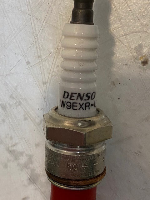 135lb Box of a Variety of Autolite, Champion, Bosch, Mighty, Denso Spark Plugs