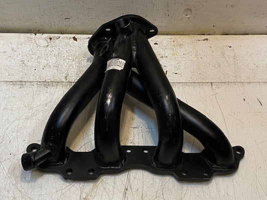 4-Arm Exhaust Manifold 40" Main Bore 14-1/2" Long 11" Wide 5-1/2" Tall