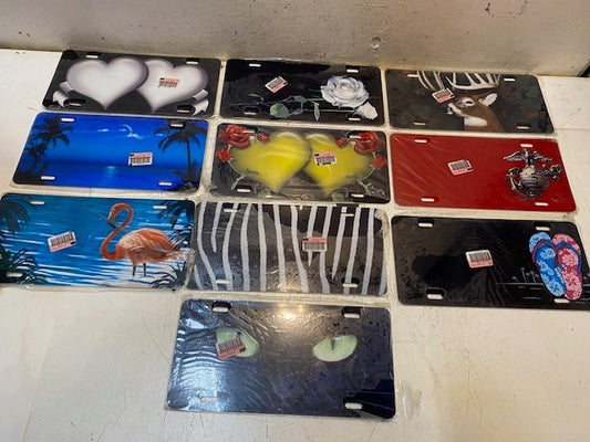 10 Qty of Various Adv. Graphics 4-Hole License Plates 11-3/4" x 5-3/4" (10 Qty)