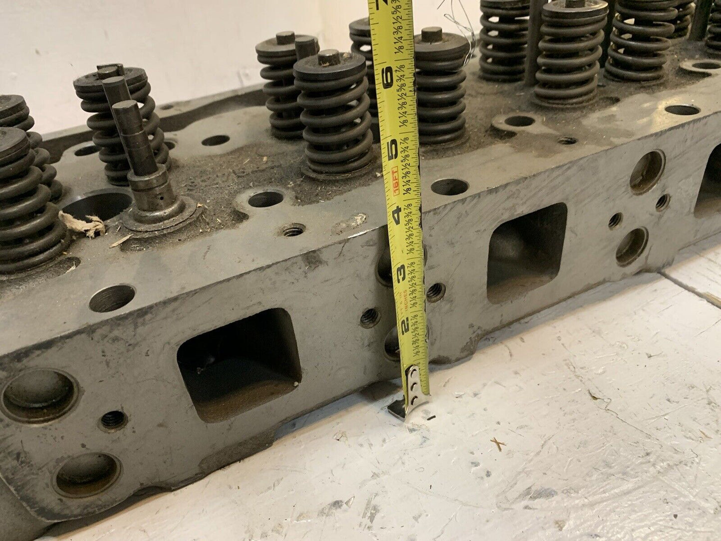 41.033 Engine Cylinder Head 327544 | 25” Long | 9” Wide | 3-3/4” Thick